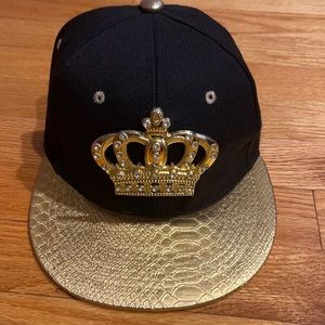 I am selling a black and gold snapback cap original